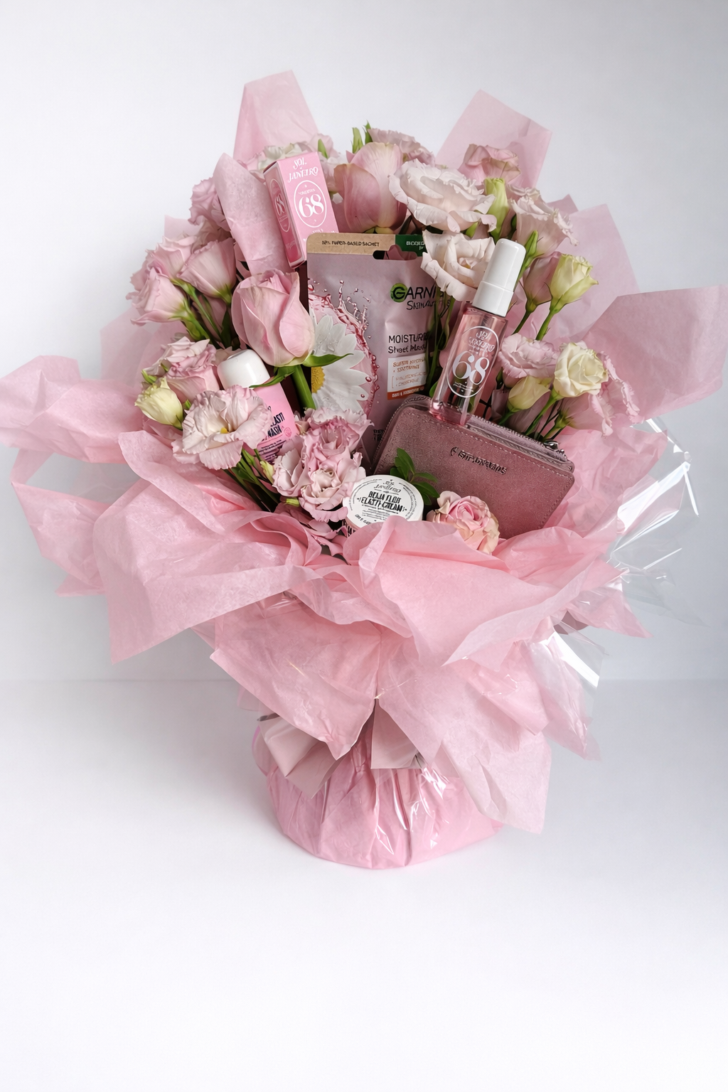 Composition sur mesure alliance de fleurs et produits de beauté